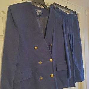 Navy blue wool dress jacket with matching pleated skirt. Size 18,